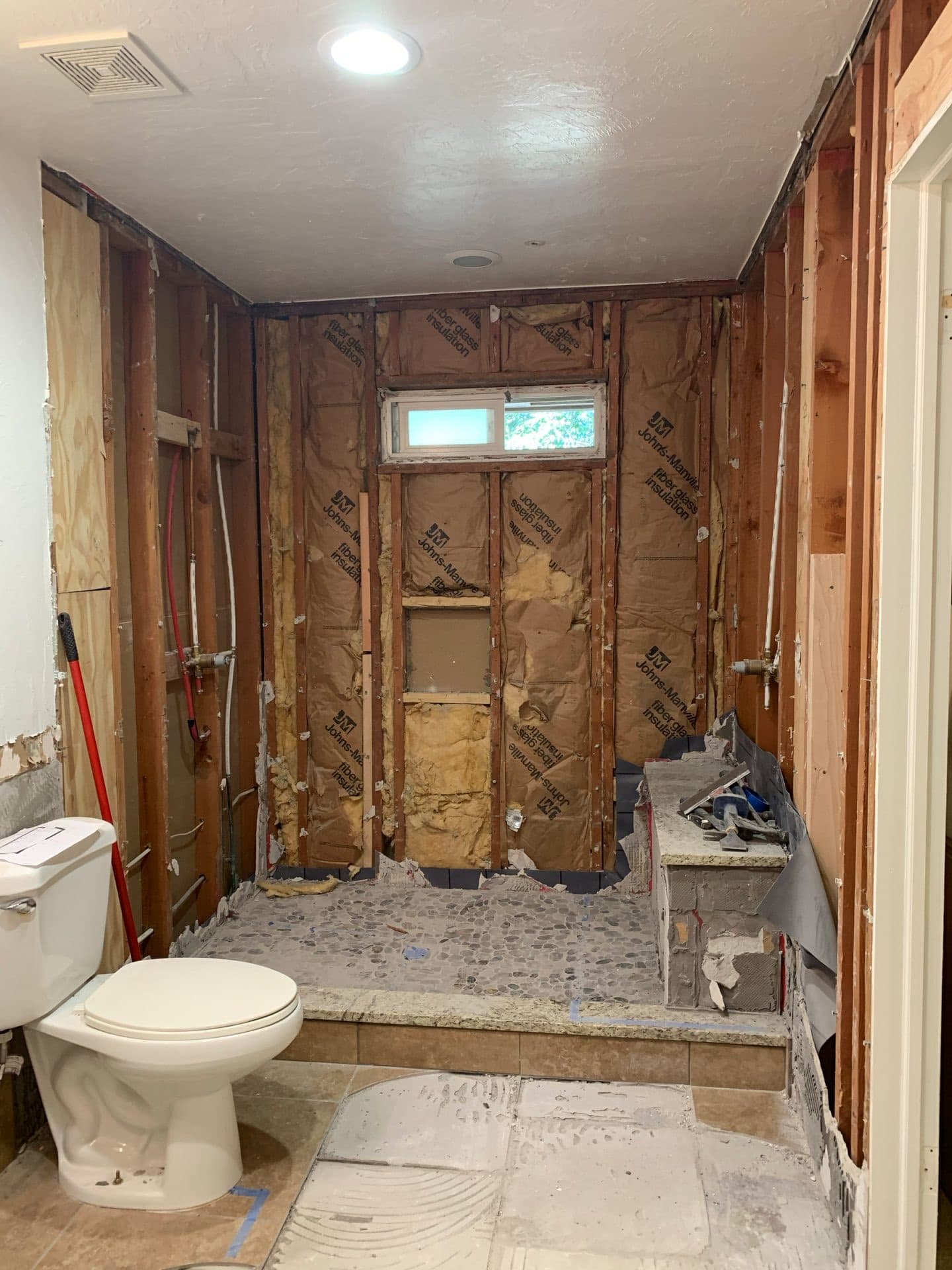 Bathroom torn down to studs by the Titan crew